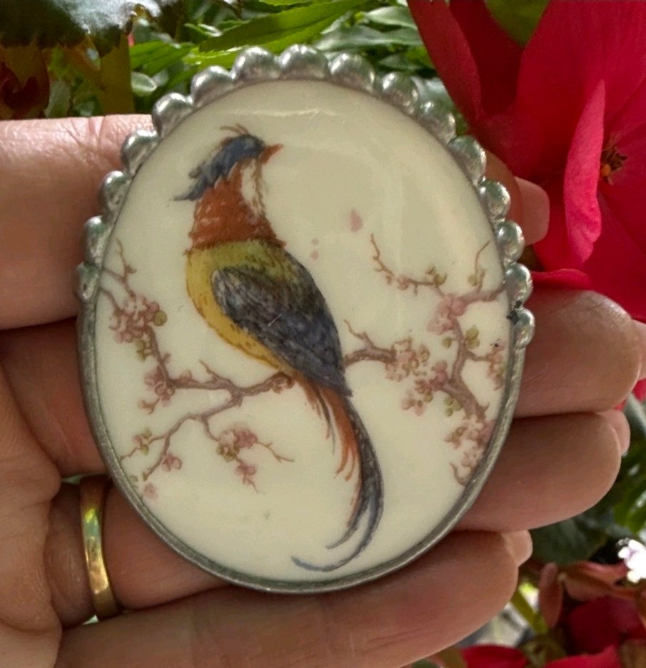 Porcelain bird brooch